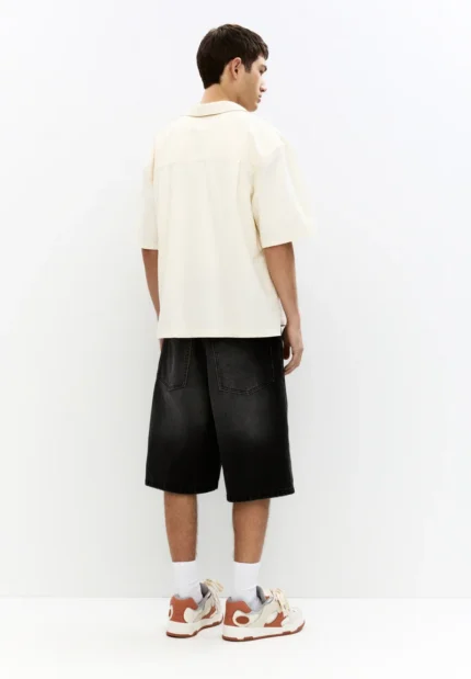 Black skater jeans shorts